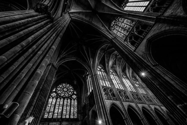 a black and white photo of the inside of a cathedral, a black and white photo, by Etienne Delessert, gothic art, vertical architecture, intense dramatic hdr, gothic rich deep colors, intricate environment - n 9