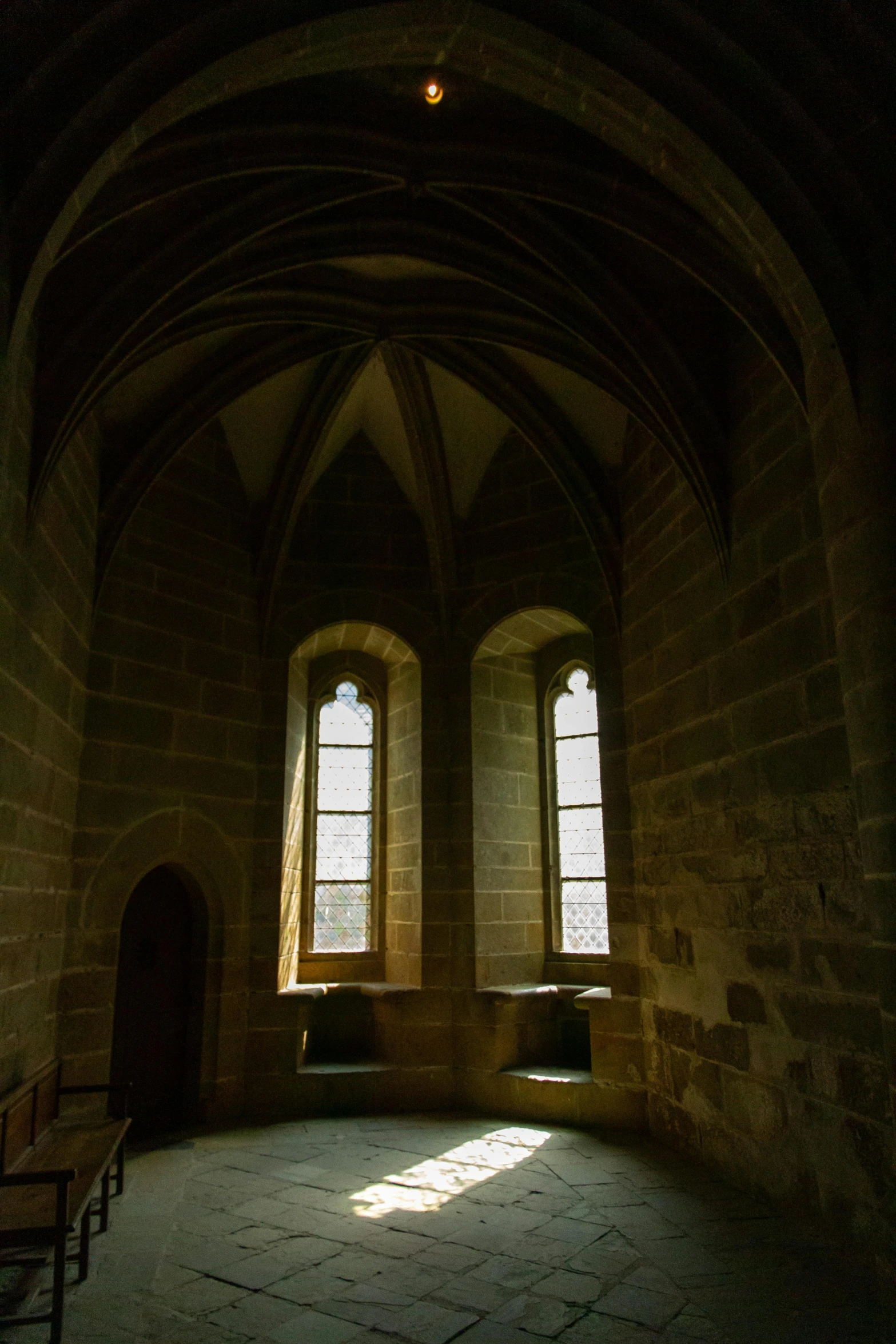 the sun shines through the windows of a church, by Andor Basch, romanesque, inside a castle library, alter, atmospheric photograph, brown