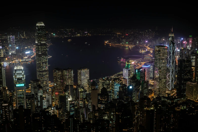 an aerial view of a city at night, pexels contest winner, city like hong kong, gigapixel photo, fan favorite, high resolution