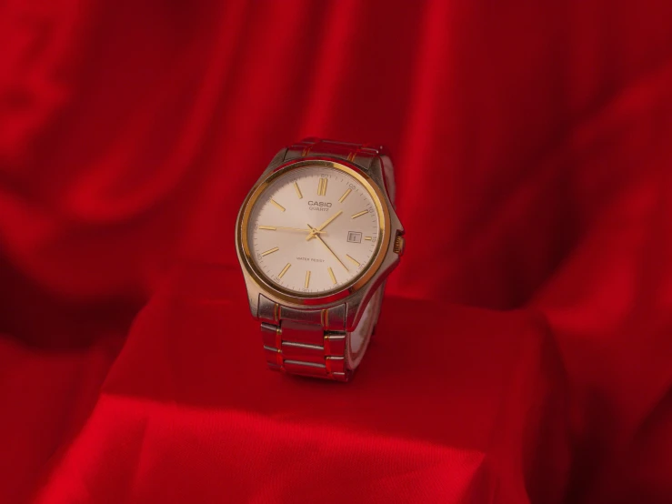 a close up of a watch on a red cloth, pexels contest winner, hyperrealism, gradient white to gold, thumbnail, japanese collection product, standing elegantly