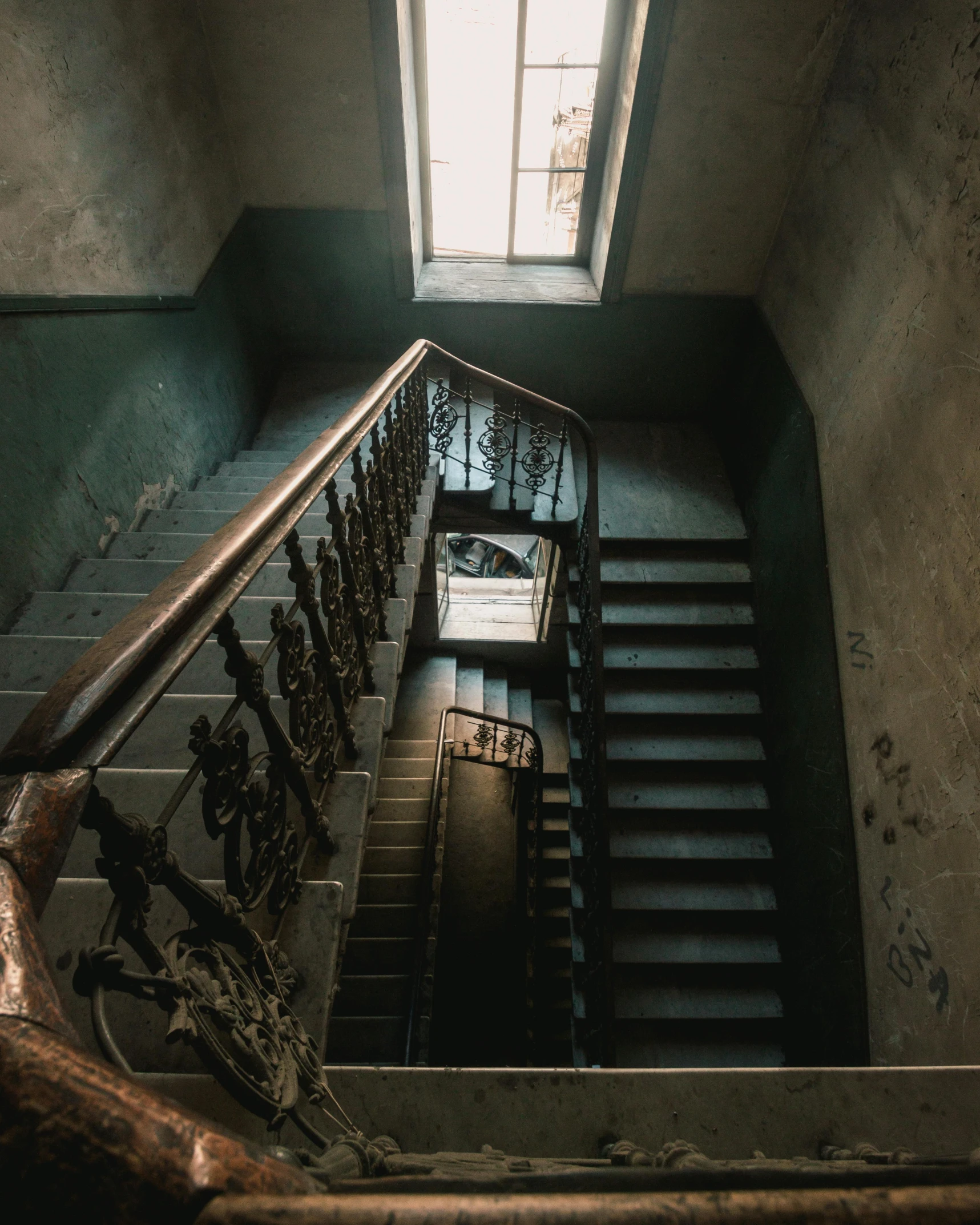 a set of stairs in an abandoned building, inspired by Elsa Bleda, pexels contest winner, neoclassicism, gothic building style, lgbtq, snapchat photo, teal aesthetic