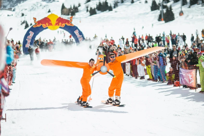 a group of people riding skis down a snow covered slope, a cartoon, by Tobias Stimmer, pexels contest winner, with real wings, max verstappen, people enjoying the show, orange demons