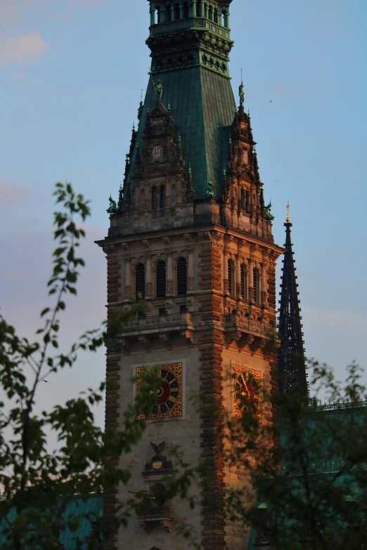 a tall tower with a clock on top of it, inspired by Georg Friedrich Schmidt, soft evening lighting, smithsonian, as seen from the canopy, battlements