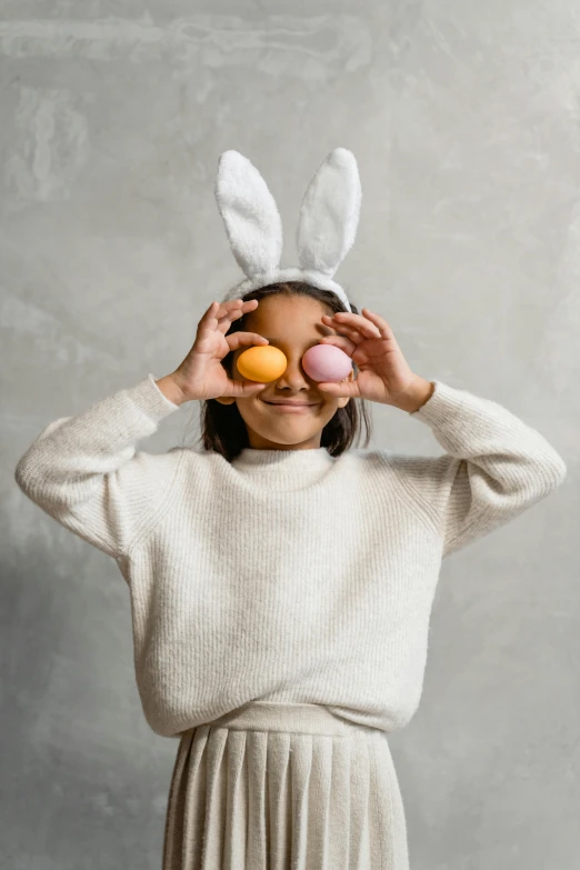 a little girl with bunny ears covering her eyes, pexels contest winner, translucent eggs, thumbnail, 1 2 9 7, model posing