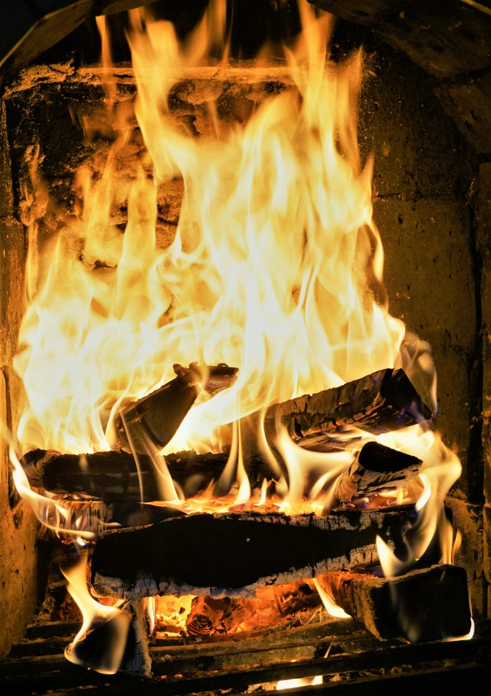 a close up of a fire in a fireplace, an album cover, pexels contest winner, 2019 trending photo, multiple stories, revolutionary, snapchat photo