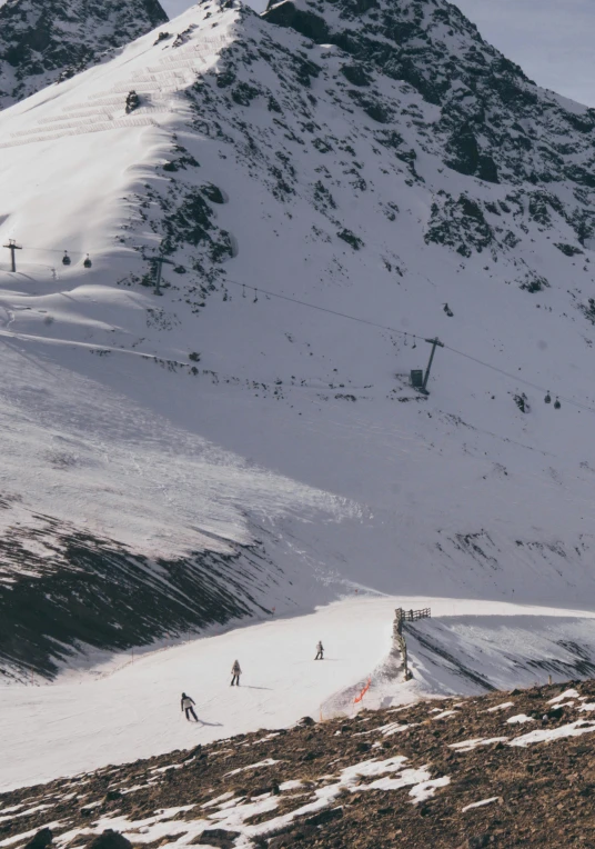 a group of people riding skis down a snow covered slope, les nabis, from the distance, afternoon hangout, no words, hypercomplex