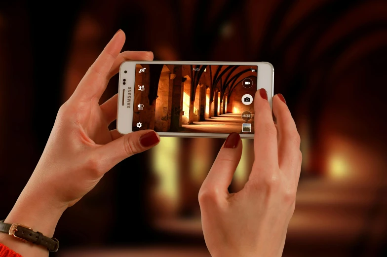 a woman taking a picture with her cell phone, by Dan Luvisi, pixabay, photorealism, wide angle lens glow in the dark, architectural shot, a wooden, blurred