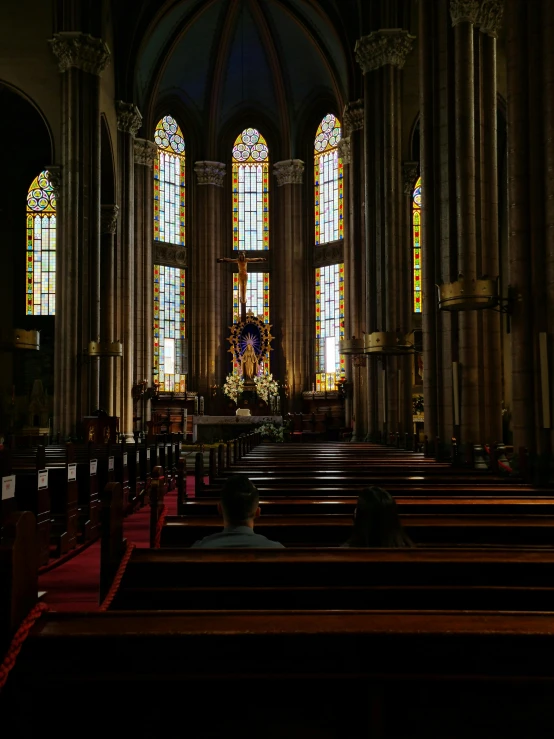 the interior of a church with stained glass windows, a photo, pexels contest winner, in sao paulo, profile image, kneeling, gif