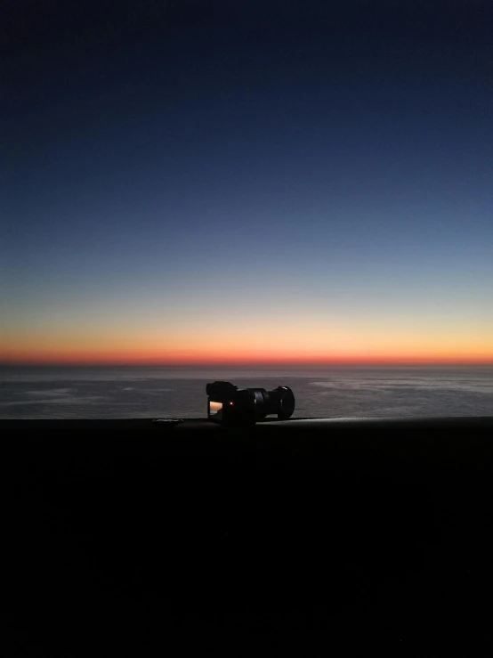 a truck parked on the side of a road at sunset, by Jeffrey Smith, pexels contest winner, overlooking the ocean, # nofilter, 2 5 6 x 2 5 6 pixels, jeep in background