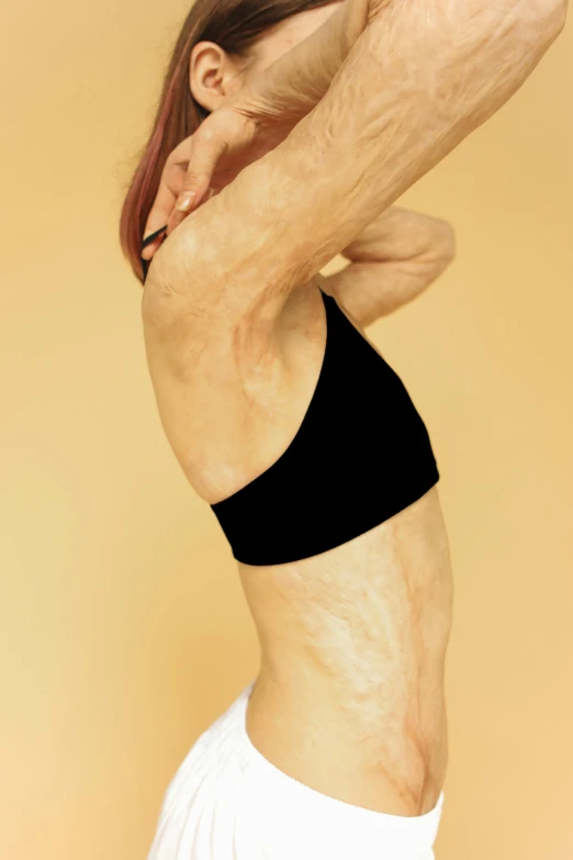 a man and a woman doing yoga together, inspired by Bert Stern, arabesque, neck zoomed in, vascularity, sport bra, profile image