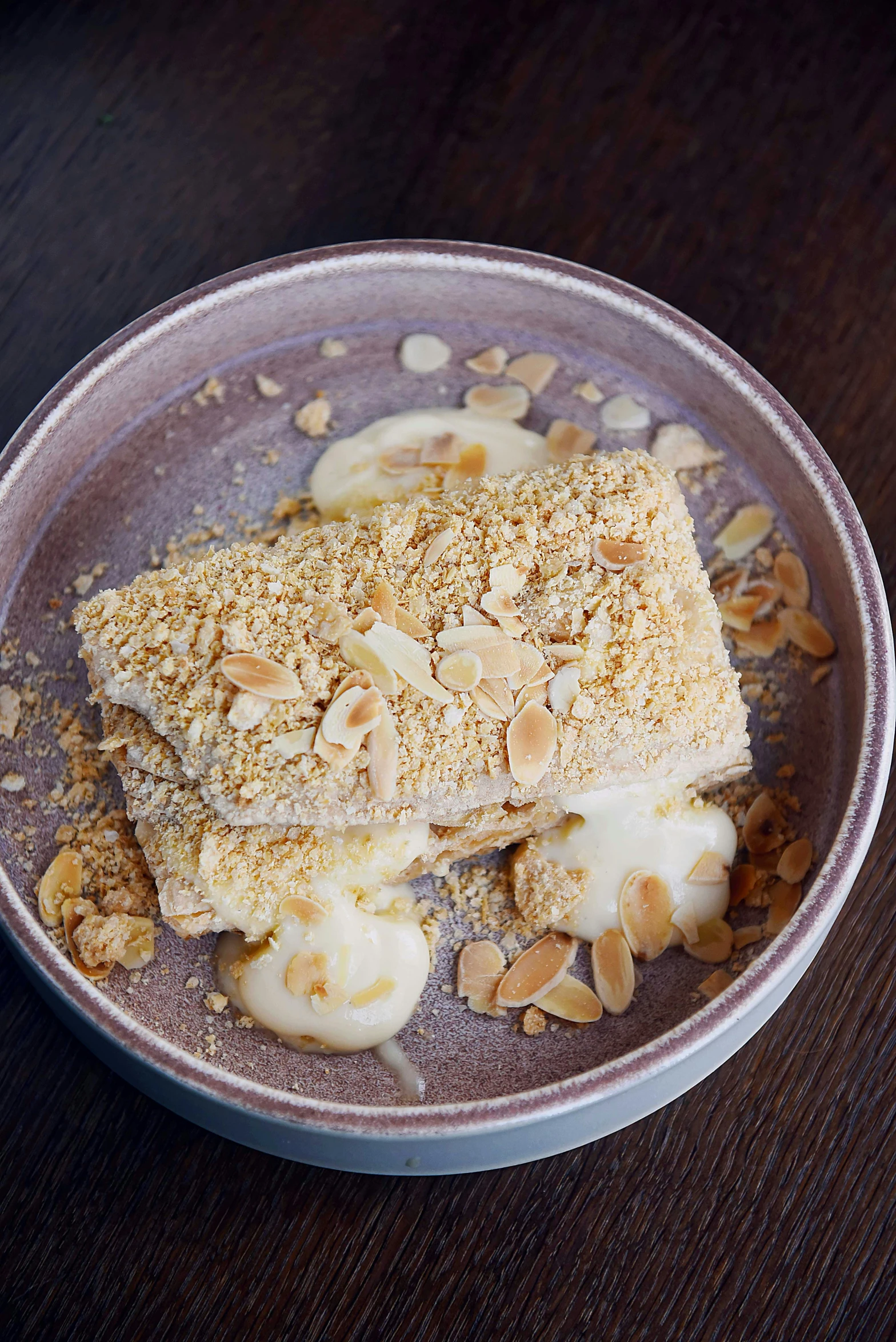 a close up of a plate of food on a table, mr sandman, dessert, slate, blonde cream