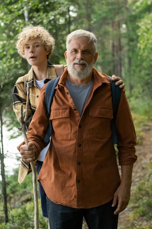 a man and a boy walking in the woods, older male, netflix, an old man with a ginger beard, centered shot