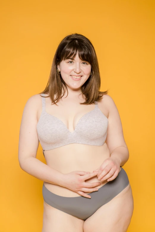 a woman in a gray underwear posing for a picture, human - shaped, product introduction photos, h3h3, half-body