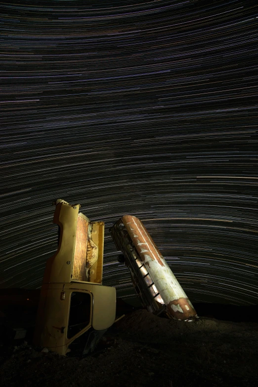 a truck that is sitting in the dirt, by Jeffrey Smith, unsplash, space art, set in observatory at night, kaleidoscope of machine guns, 3/4 view from below, detail shots