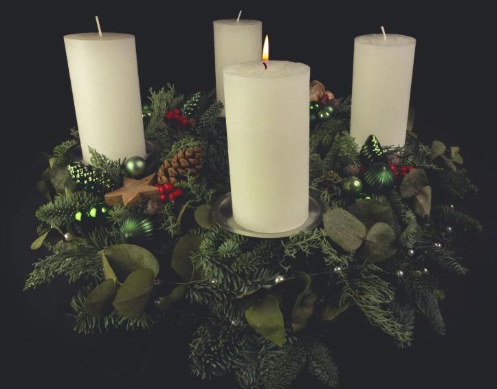 a group of three white candles sitting on top of a wreath, pexels, baroque, with a long white, four, an ultra realistic, evening