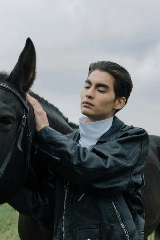 a man standing next to a horse in a field, an album cover, inspired by Tadashi Nakayama, baroque, masculine jawline, she wears leather jacket, f 1 driver charles leclerc, asian human