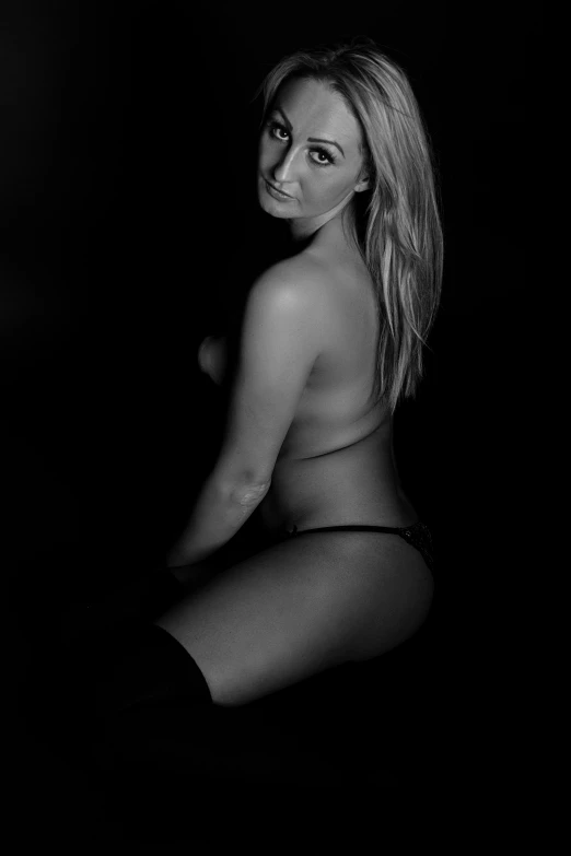 a black and white photo of a naked woman, a black and white photo, flickr, a gorgeous blonde, cheeky!!!, studio photoshoot, club photography