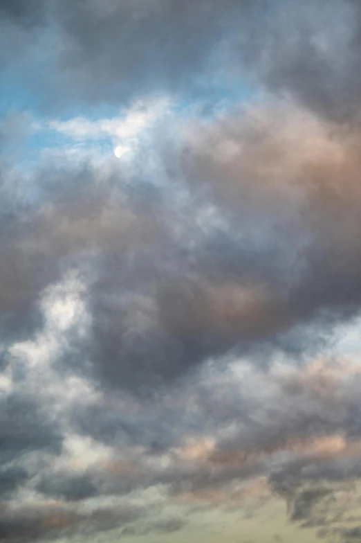 a large jetliner flying through a cloudy sky, by Neil Blevins, tonalism, soft blue and pink tints, ethereal lighting - h 640, morning detail, multicoloured