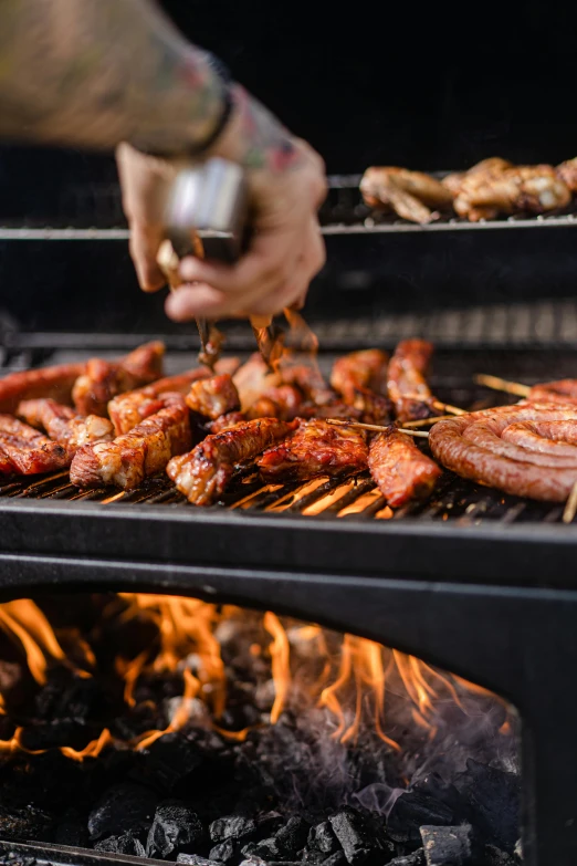 a man is cooking meat on a grill, visually striking, deeply detailed, te pae, multi-part