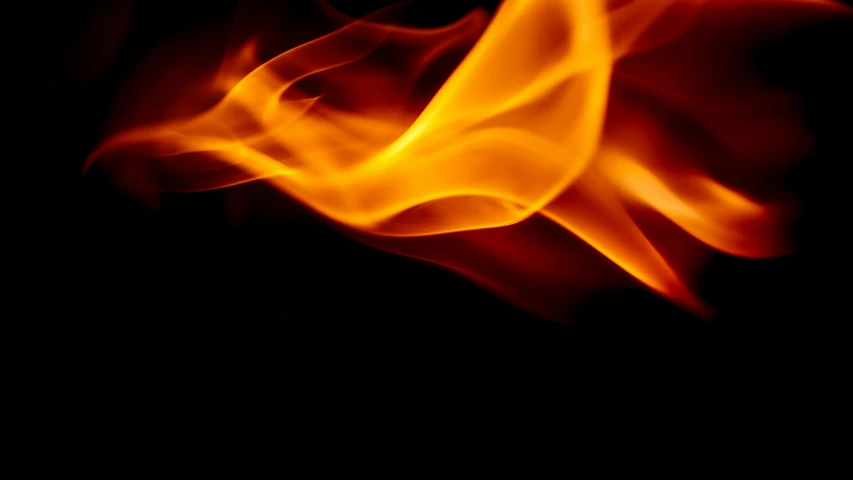 a close up of a fire on a black background, pexels, swoosh, profile image, flare, instagram post