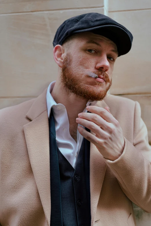 a man in a suit and hat smoking a cigarette, inspired by Harry Haenigsen, trending on pexels, renaissance, ginger hair, trenchcoat, australian, pastel'