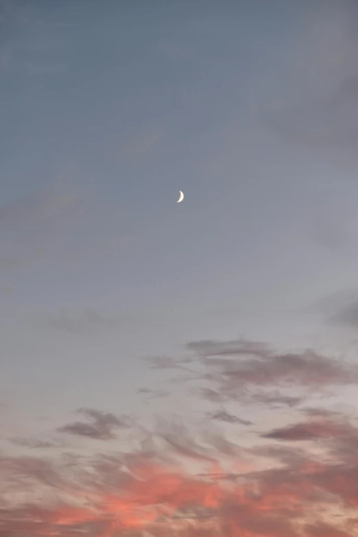 a large body of water with a moon in the sky, a picture, by Peter Churcher, postminimalism, sherbert sky, soft light - n 9, crescent moon, slightly pixelated