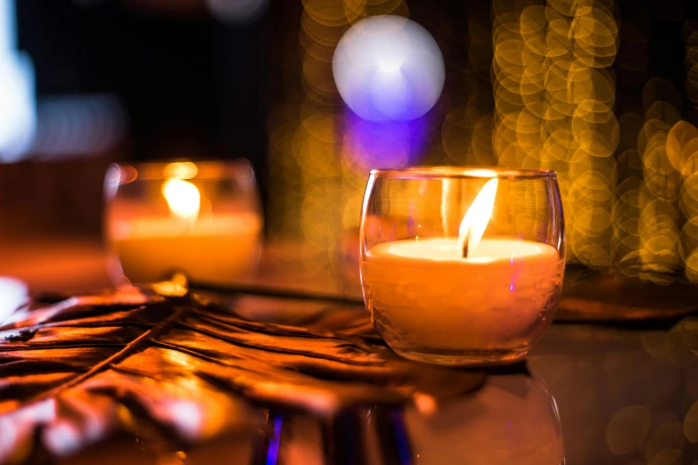 a couple of candles sitting on top of a table, pexels, avatar image, partylights, place setting, instagram post