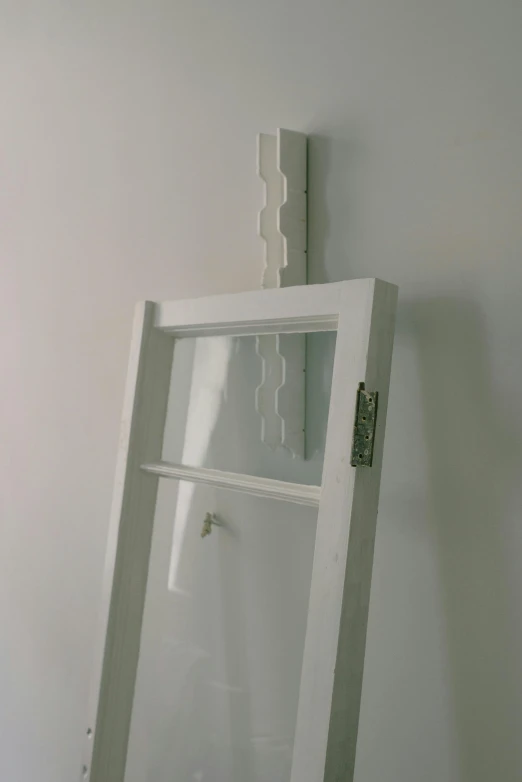 a ladder leaning against a wall next to a window, inspired by Rachel Whiteread, profile picture, full lenght view. white plastic, rhys lee, medium close up