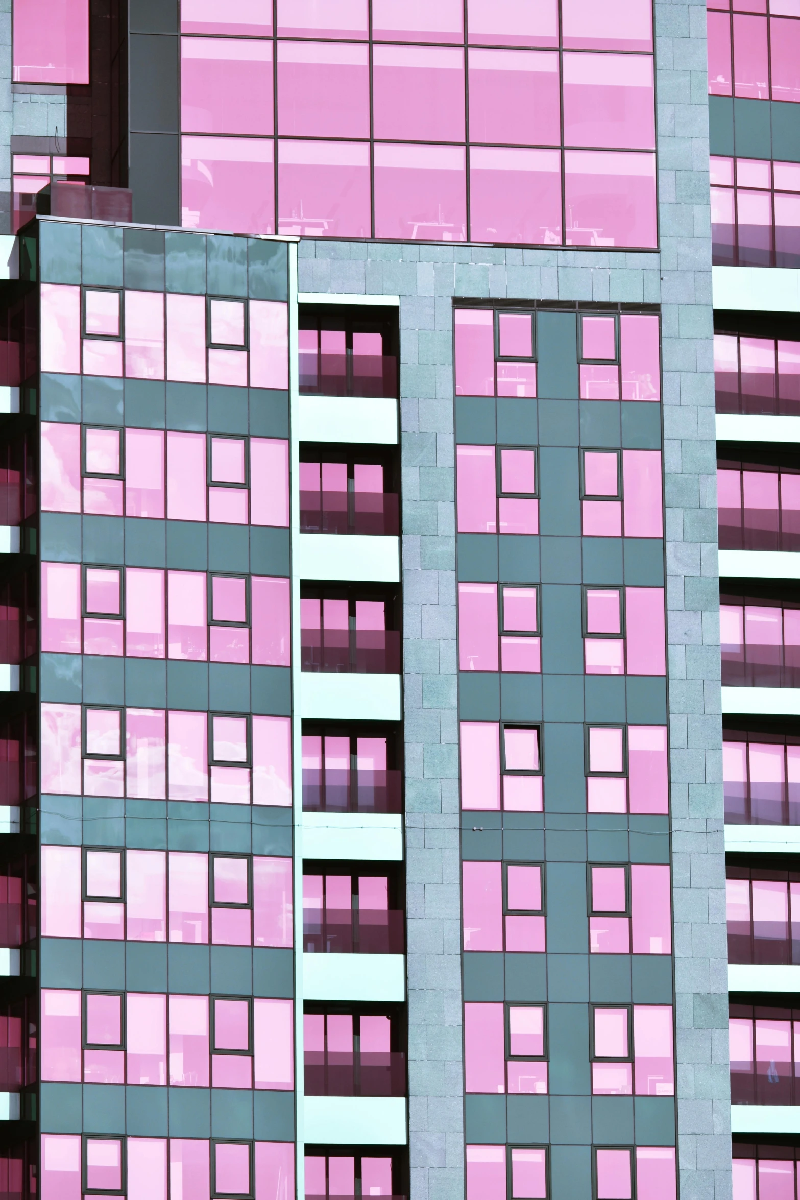 a very tall building with lots of windows, inspired by Ricardo Bofill, flickr, magenta and gray, zoomed in, ((pink)), hotel room