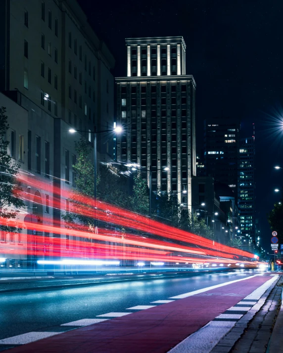 a city street filled with lots of traffic at night, an album cover, unsplash contest winner, optical fiber, warsaw, thumbnail, in neotokyo