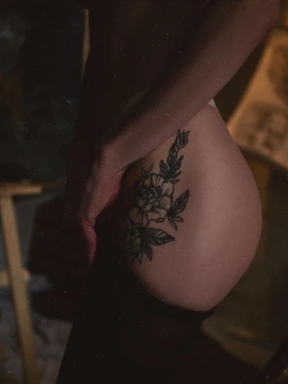 a woman with a tattoo on her stomach, inspired by Elsa Bleda, pexels contest winner, depicting a flower, toned derriere, 🤤 girl portrait, tattoo parlor photo