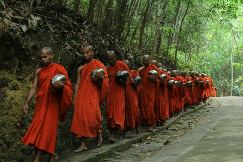 a group of monks standing on the side of a road, sumatraism, avatar image