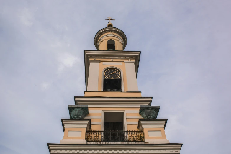 a tall tower with a clock on top of it, by Andrei Kolkoutine, pexels contest winner, baroque, elevation view, front side, square, color image