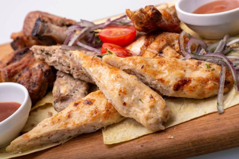 a wooden cutting board topped with meat and veggies, a picture, greeks, battered, background image, up close