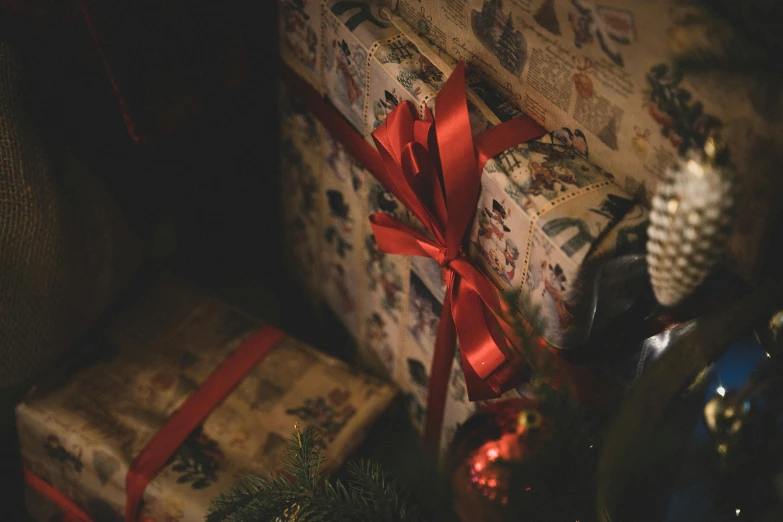 a pile of presents sitting next to a christmas tree, pexels contest winner, private press, red ribbon, moody details, avatar image, opening shot