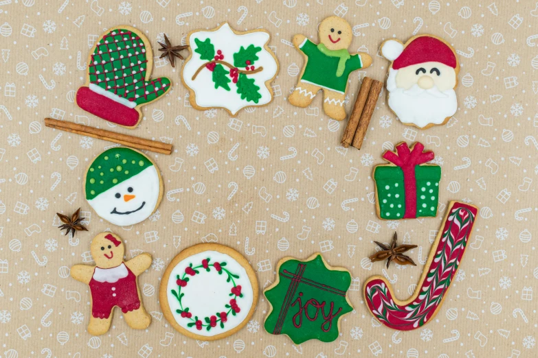 christmas cookies arranged in a circle on a table, by Sylvia Wishart, pexels, naive art, square, background image, fabric embroidery, high resolution!!