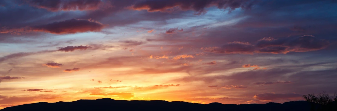 a sunset with clouds and mountains in the background, by Carey Morris, pexels contest winner, romanticism, beautiful new mexico sunset, panels, multicolored, summer sky