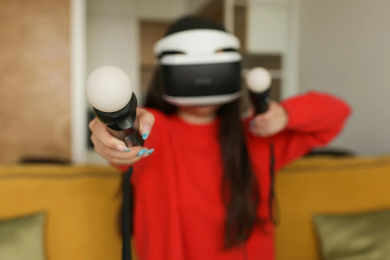 a woman in a red shirt holding a video game controller, inspired by Niko Henrichon, floating vr headsets, on ps5, hanging out with orbs, light source from the left