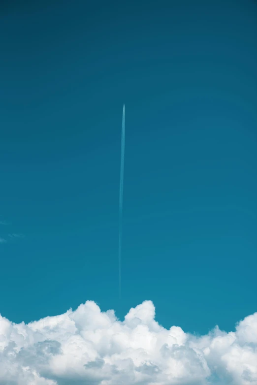 a plane that is flying in the sky, by Andries Stock, postminimalism, a tall, cloud, sky blue, rocket