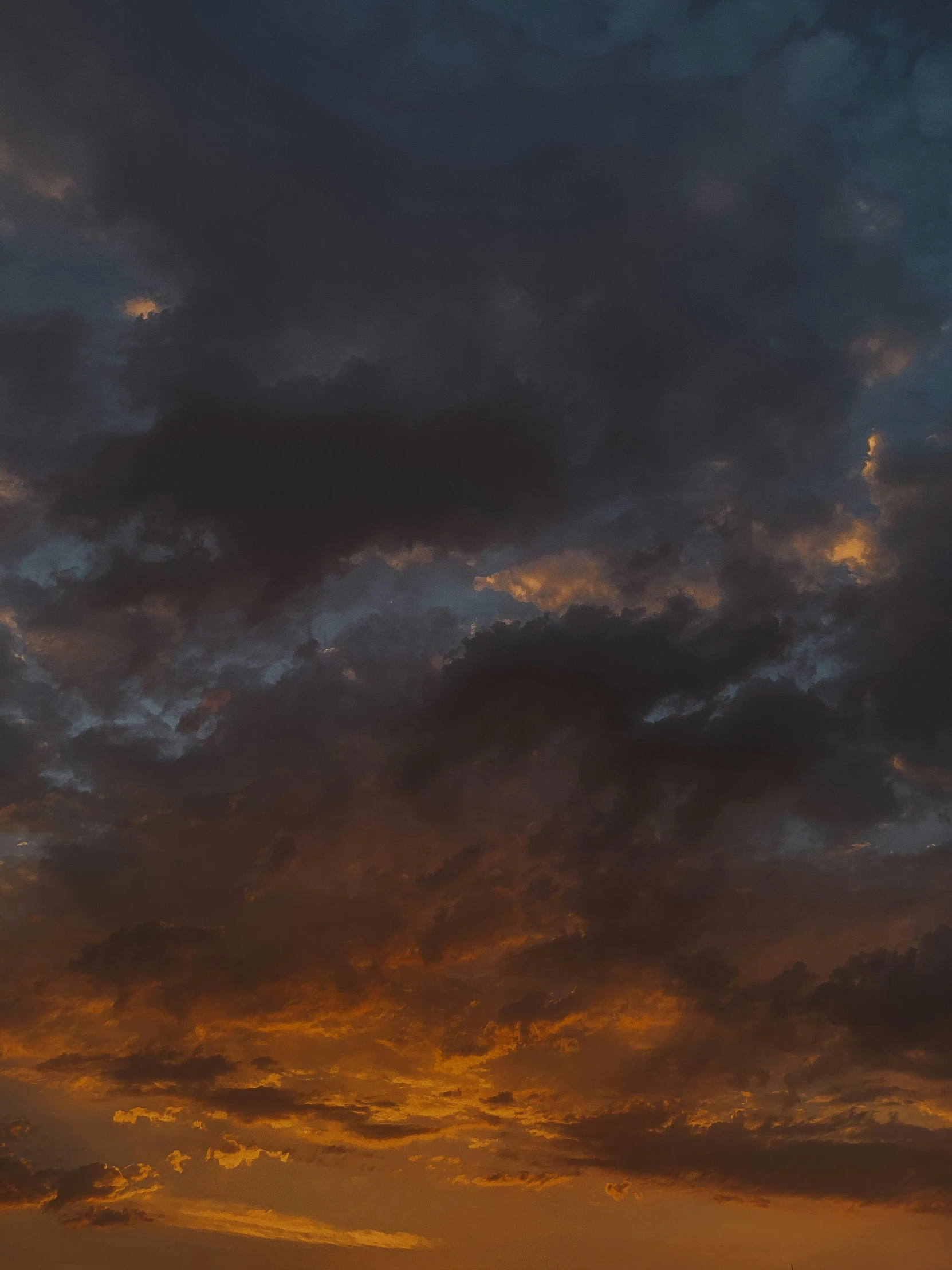 a large body of water under a cloudy sky, a picture, unsplash, romanticism, orange lit sky, color ( sony a 7 r iv, alessio albi, dark mammatus cloud