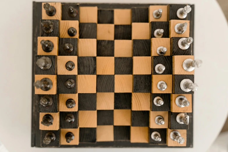 a close up of a chess board on a toilet, by Josef Čapek, unsplash, op art, fan favorite, preserved museum piece, aged 13, thumbnail