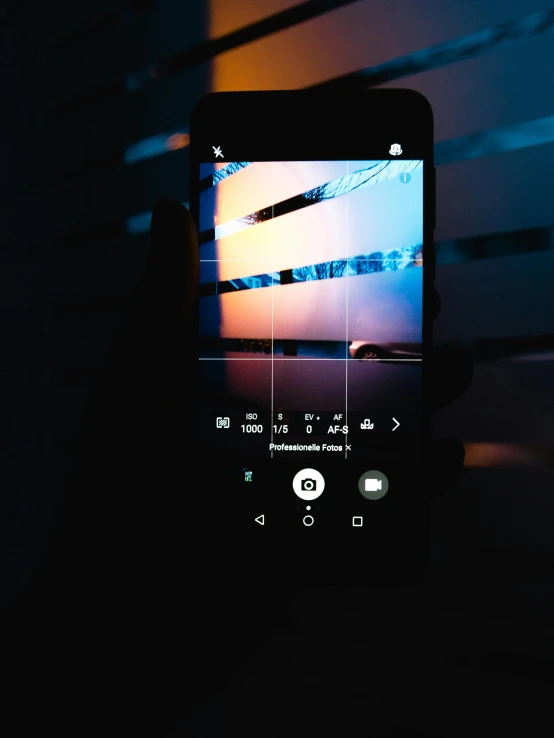 a person taking a picture with their cell phone, by Android Jones, pexels contest winner, video art, dark mode, digital ui, iphone screenshot, dramatic lighting - n 9