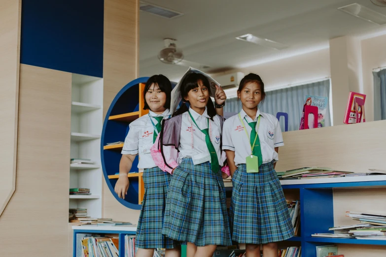 a group of young girls standing next to each other, pexels contest winner, ashcan school, infinite library, in style of thawan duchanee, avatar image, three