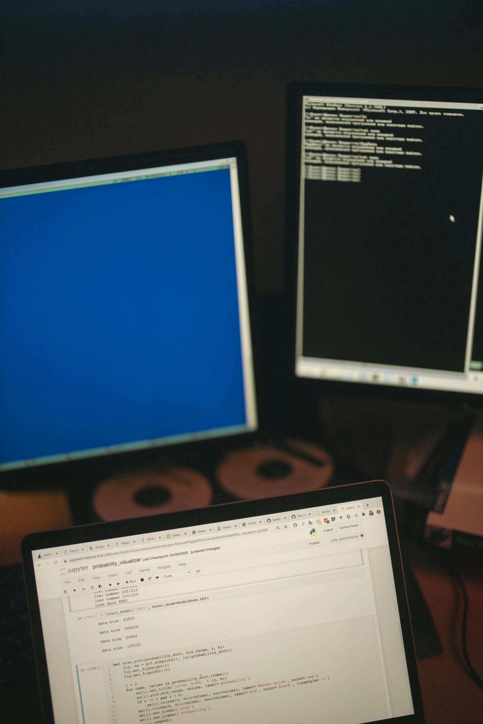 a laptop computer sitting on top of a wooden desk, reddit, computer art, crt screens in background, hacking, ilustration, blue backlight