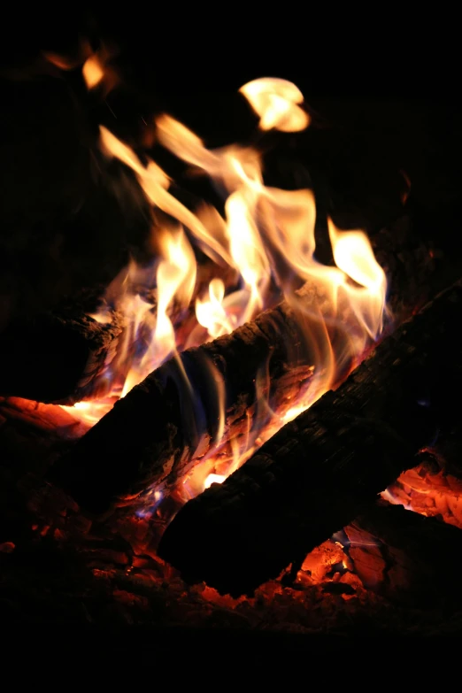 a close up of a fire in the dark, warm wood, avatar image, fire pit, multiple stories