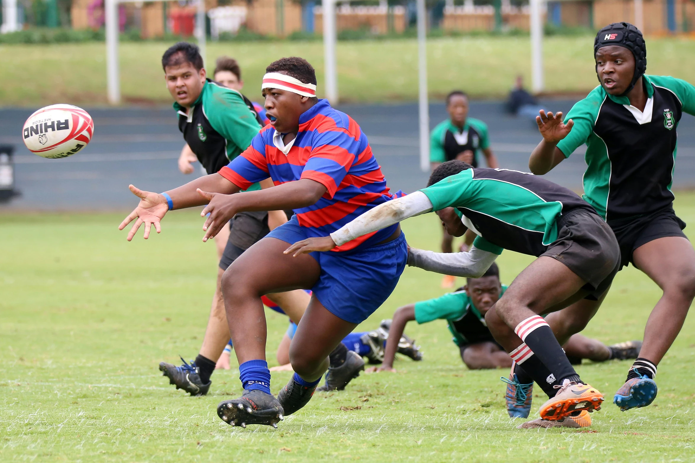 a group of young men playing a game of rugby, 💣 💥💣 💥, 15081959 21121991 01012000 4k, no blur, high resolution image