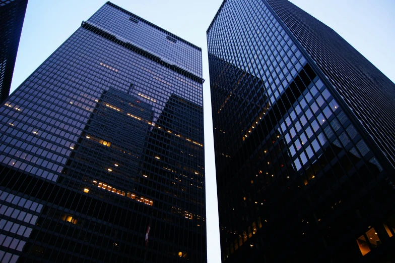 a couple of tall buildings sitting next to each other, by Adam Rex, pexels contest winner, corporate, toronto, mies van der rohe, 2000s photo