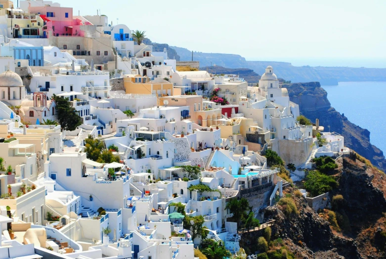 a bunch of buildings that are on the side of a hill, pexels contest winner, art nouveau, greek ethnicity, white colors, vacation, youtube thumbnail
