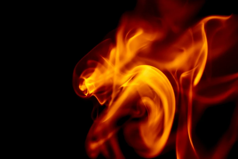 a close up of a fire on a black background, a digital rendering, by Daniel Lieske, pexels, profile image, flare, slow shutter, ilustration