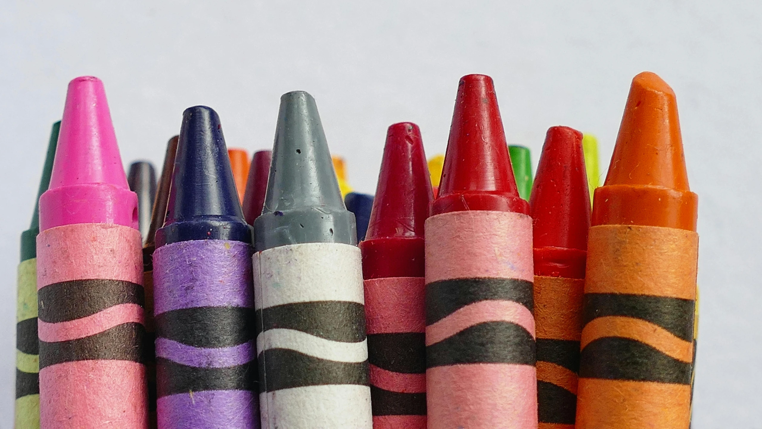 a group of crayons sitting next to each other, by Carey Morris, pexels contest winner, crayon art, on a pale background, no colors, two colors, eric carle